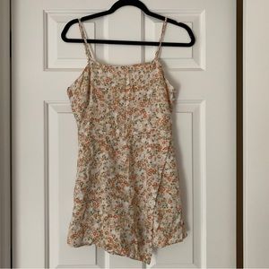 Asymmetric hem flower romper